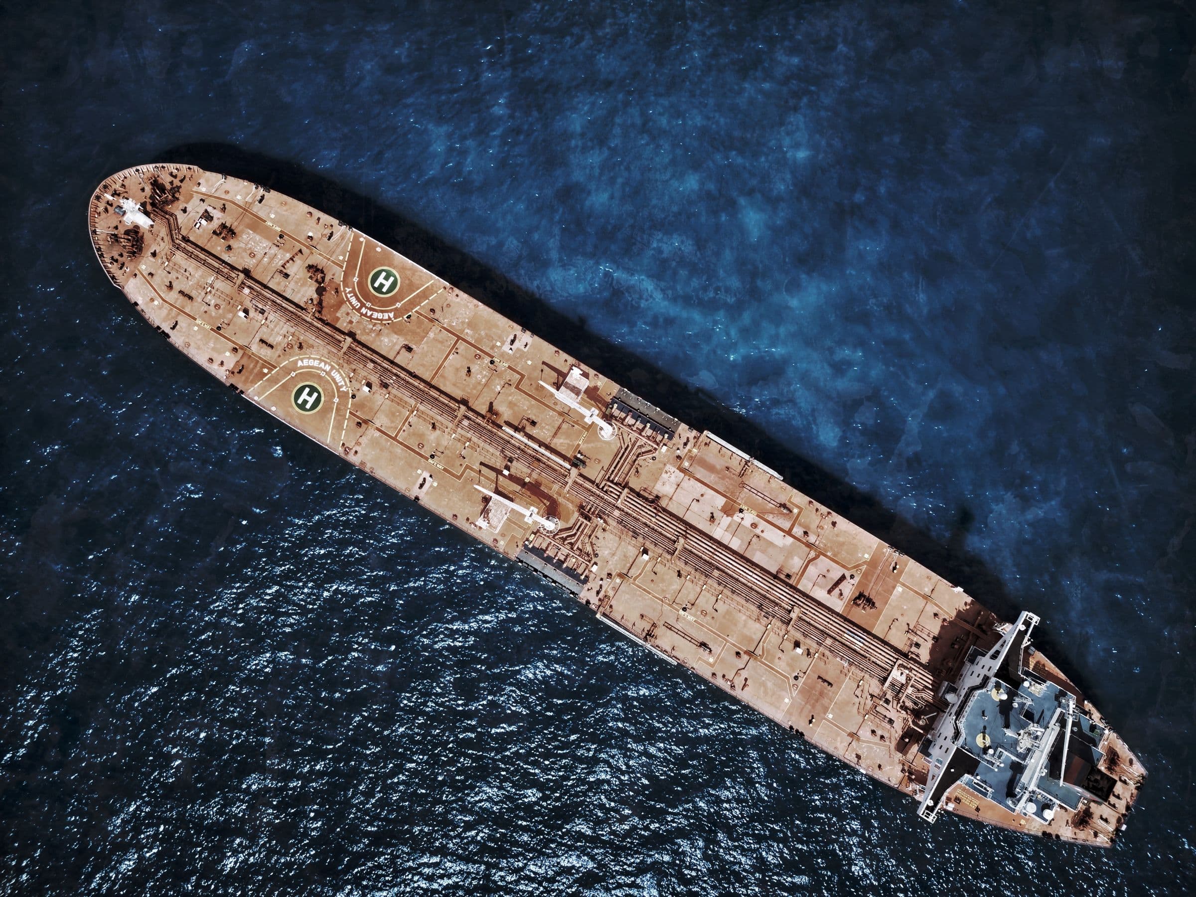 Aerial view of a crude oil tanker under way on deep blue water